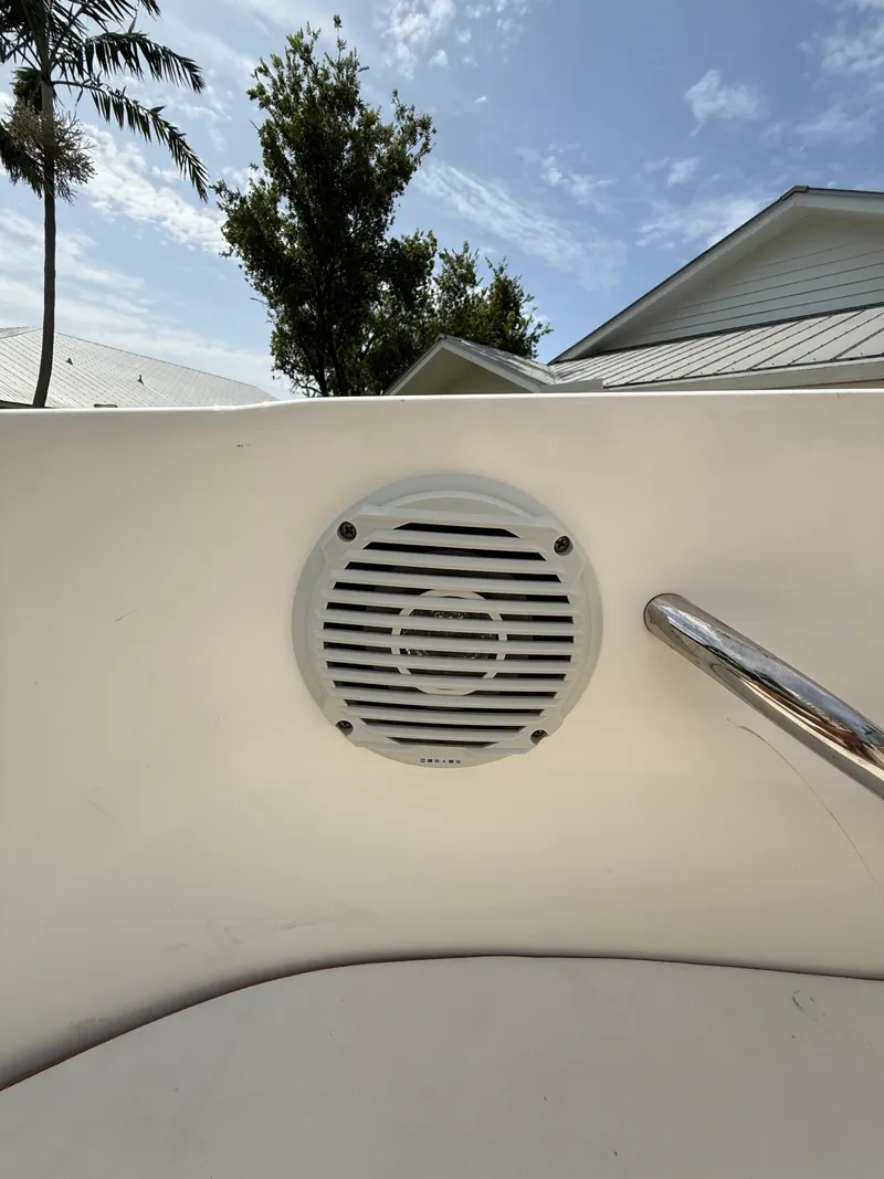 Slide: The Image of 2019 Bayliner VR4 Bowrider OB boat speaker and railing under clear sky. - 4