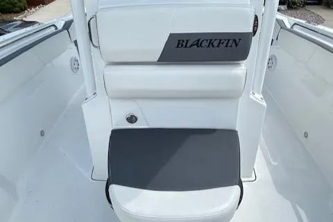 Slide: The Image of 2019 Blackfin 242 CC boat interior with cushioned seating and sleek design. - 21