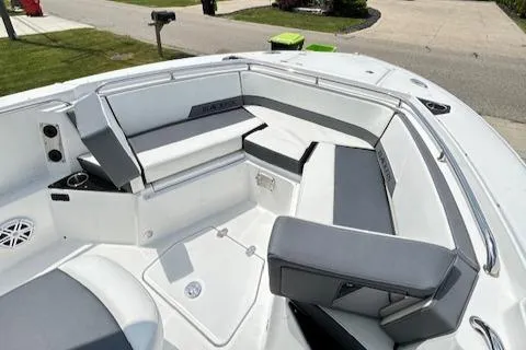 Slide: The Image of 2019 Blackfin 242 CC boat interior with sleek seating and modern design. - 26