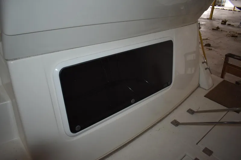 Slide: The Image of 2000 Cruisers Yachts 4450 Express Motoryacht, exterior storage compartment view. - 15