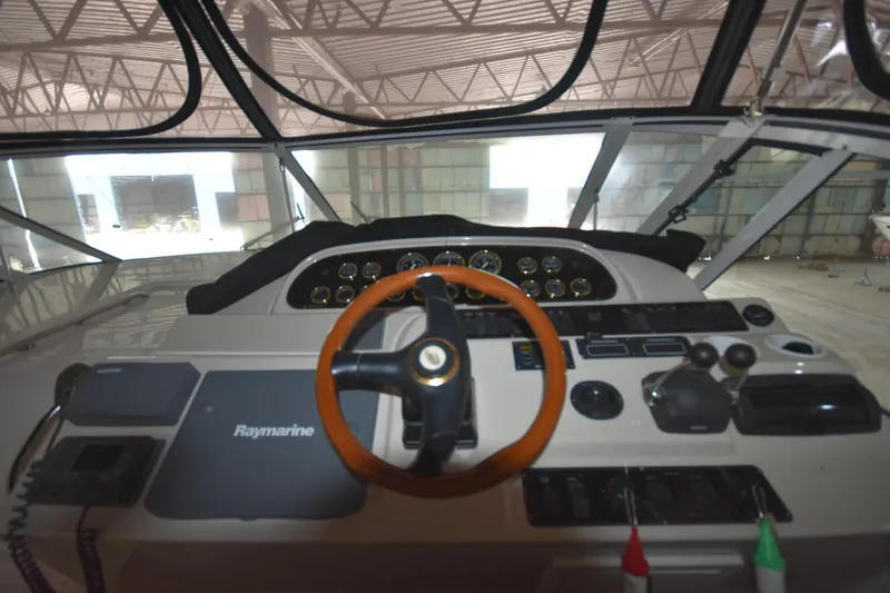 Slide: The Image of Helm of 2000 Cruisers Yachts 4450 Express Motoryacht with Raymarine equipment. - 26