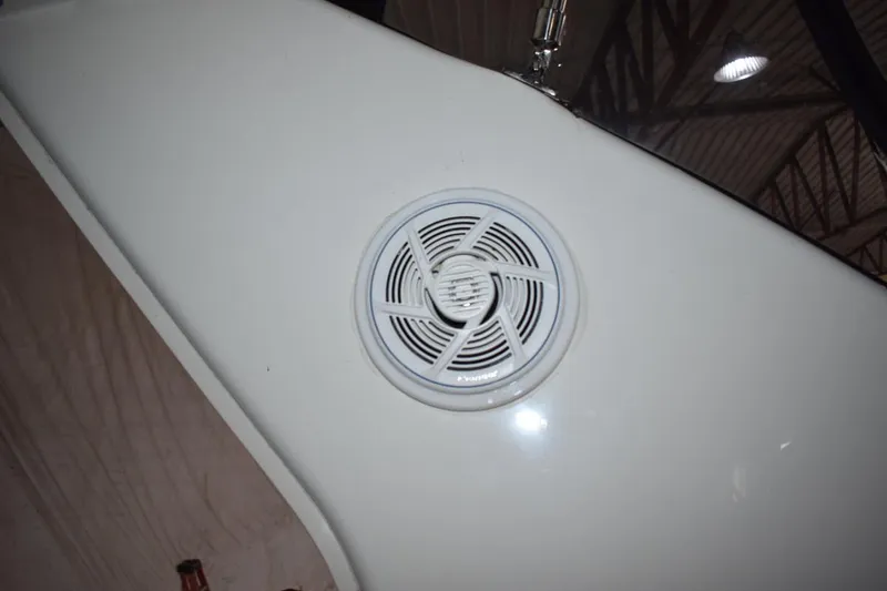 Slide: The Image of Speaker on 2000 Cruisers Yachts 4450 Express Motoryacht, showcasing interior audio system. - 33