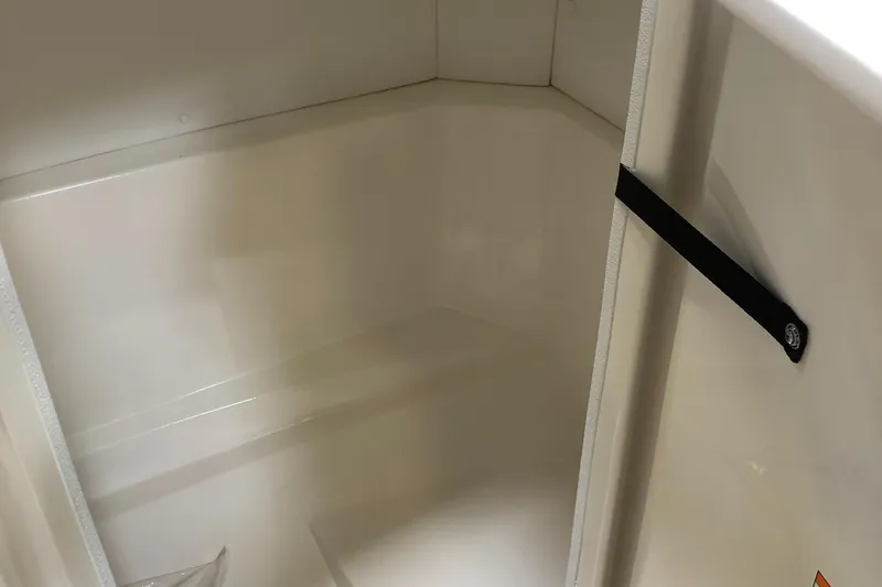 Slide: The Image of Interior storage compartment of 2025 Sea Ray SPX 230 boat. - 10