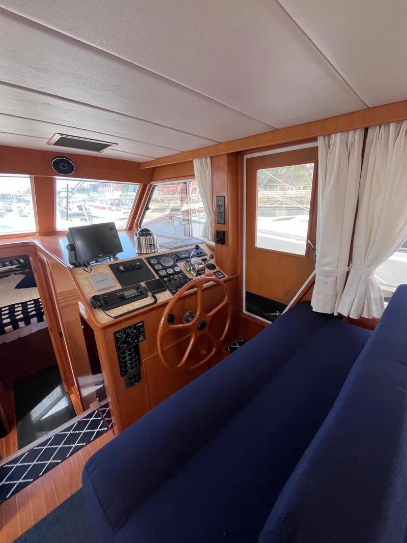 Slide: The Image of Symbol 42' Sun Deck Trawler 2000 - 42