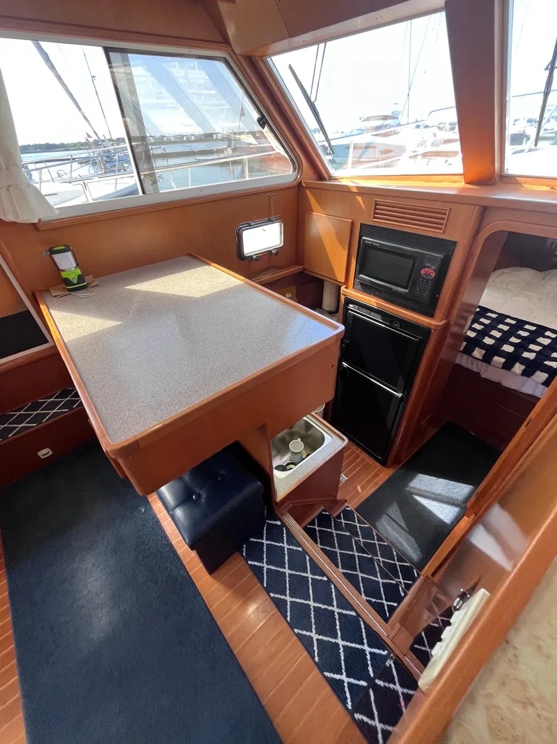 Slide: The Image of Symbol 42' Sun Deck Trawler 2000 - 48