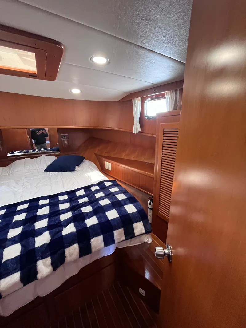 Slide: The Image of Symbol 42' Sun Deck Trawler 2000 - 56