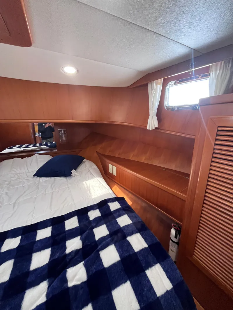 Slide: The Image of Symbol 42' Sun Deck Trawler 2000 - 57