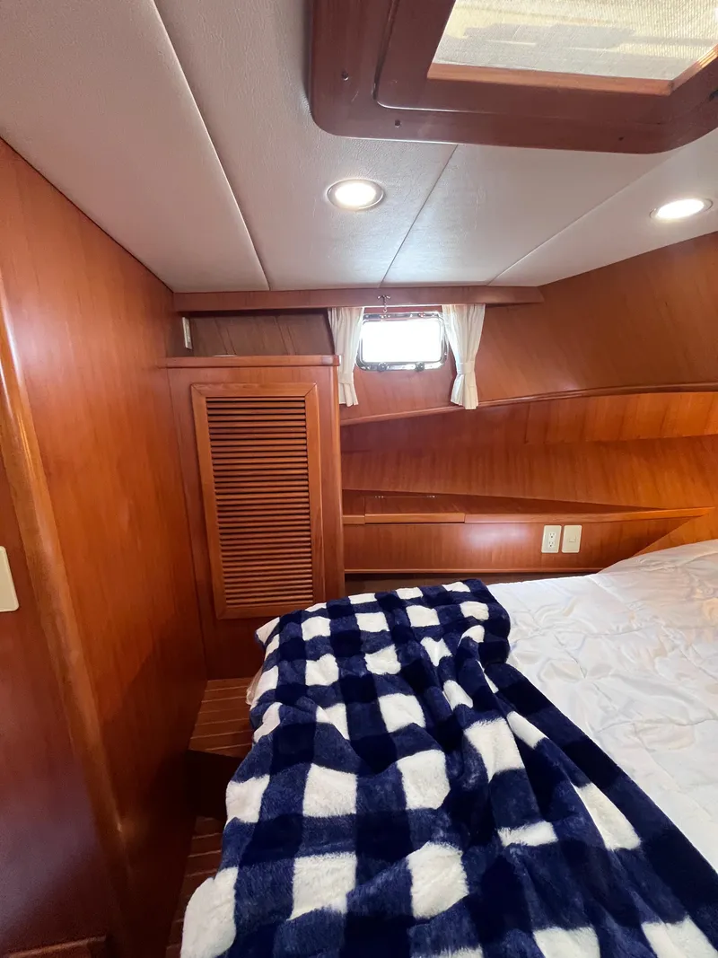 Slide: The Image of Symbol 42' Sun Deck Trawler 2000 - 60