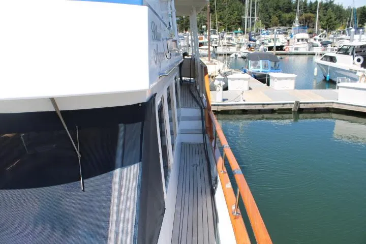 Slide: The Image of 1983 Ocean Alexander 43 Flush Aft Deck - side deck, looking aft - 10