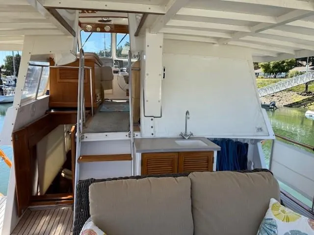 Slide: The Image of 1983 Ocean Alexander 43 Flush Aft Deck - aft deck looking forward - 13