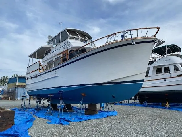 Slide: The Image of 1983 Ocean Alexander 43 Flush Aft Deck yacht on stands, ready for maintenance. - 4