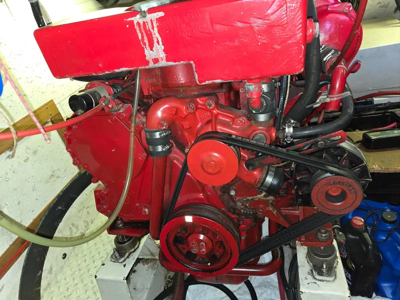 Slide: The Image of Red engine of a 1983 Ocean Alexander 43 Flush Aft Deck boat, engine. - 43