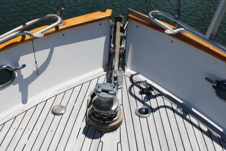 Slide: The Image of 1983 Ocean Alexander 43 Flush Aft Deck yacht bow with anchor winch - 9