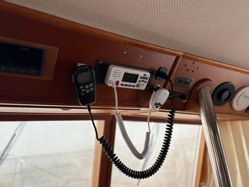 Slide: The Image of Interior of 1986 Grand Banks 36 Classic with communication equipment and wooden paneling. - 11