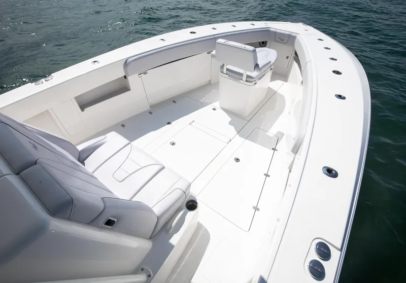 Slide: The Image of 2024 SeaVee Open Fisherman 390Z boat interior with sleek seating and spacious deck. - 10