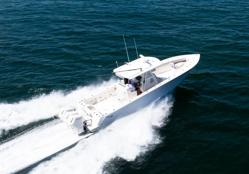 Slide: The Image of 2024 SeaVee Open Fisherman 390Z cruising on open water, aerial view. - 4
