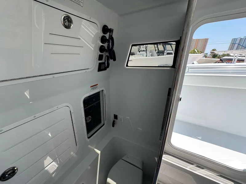 Slide: The Image of Interior of 2026 Invincible 43 Open Fisherman boat, featuring sleek design and modern amenities. - 14