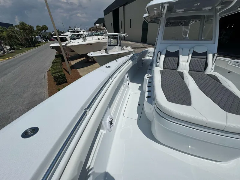 Slide: The Image of 2026 Invincible 43 Open Fisherman boat with sleek seating and modern design. - 22