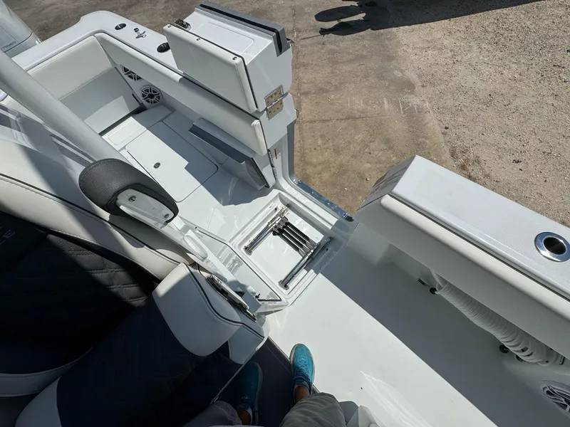 Slide: The Image of 2026 Invincible 43 Open Fisherman boat interior with seating and storage compartments. - 32