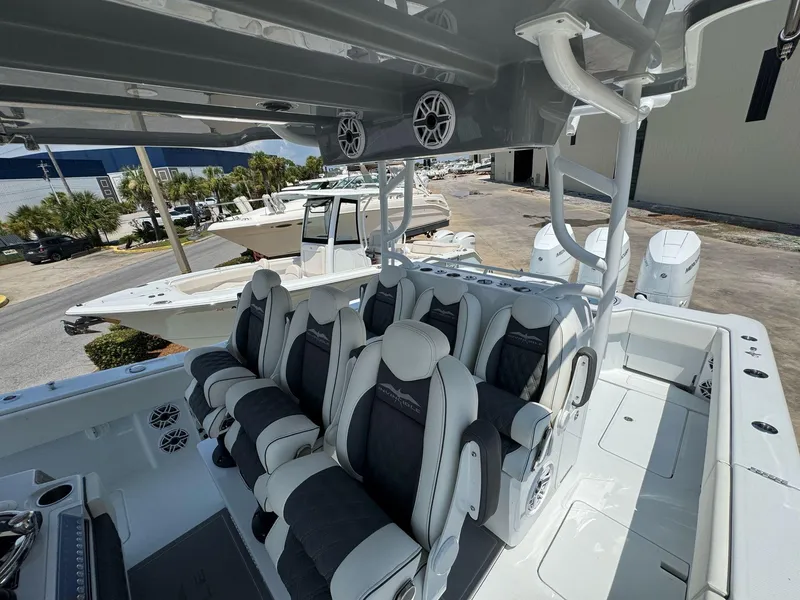 Slide: The Image of 2026 Invincible 43 Open Fisherman boat with luxurious seating and modern design. - 34