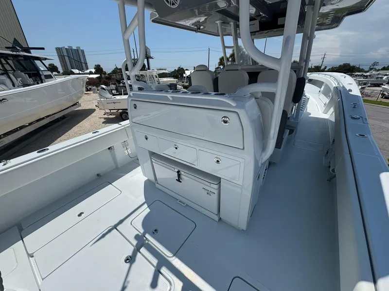 Slide: The Image of 2026 Invincible 43 Open Fisherman boat interior with seating and storage compartments. - 41