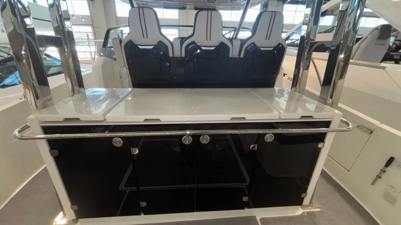 Slide: The Image of 2024 Jeanneau Leader 12.5 WA interior with sleek seating and modern design. - 7