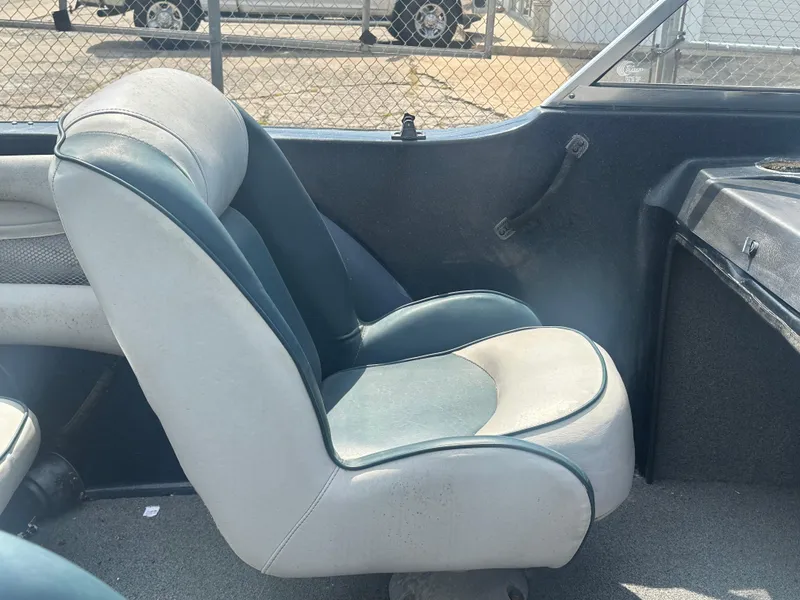 Slide: The Image of 2007 Stratos 486 Ski-N-Fish boat interior with cushioned seat. - 10