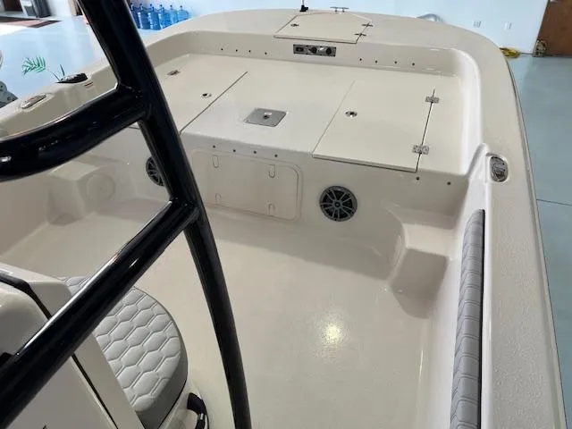 Slide: The Image of 2025 Carolina Skiff 23 LS boat interior with storage compartments and seating. - 10