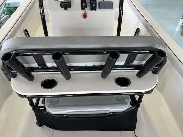Slide: The Image of 2025 Carolina Skiff 23 LS boat interior with rod holders and storage. - 4