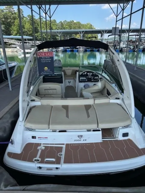 Slide: The Image of 2018 Regal 2000 ES Bowrider boat for sale, docked in a marina. - 4