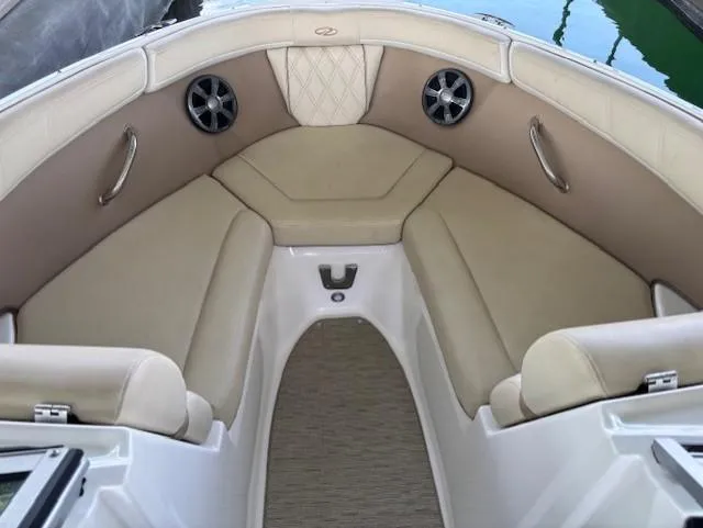 Slide: The Image of 2018 Regal 2000 ES Bowrider interior with beige seating and stainless steel accents. - 8