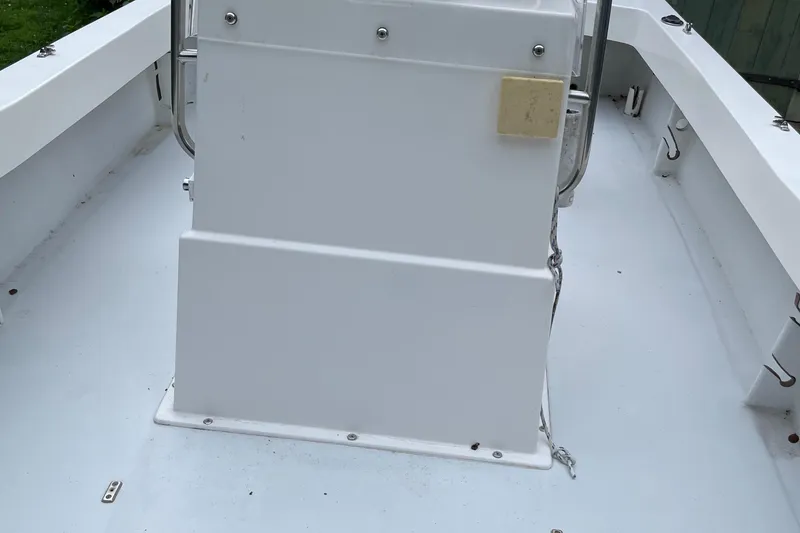 Slide: The Image of 2006 NorthCoast 180 Center Console boat interior, featuring a clean white deck and console. - 6