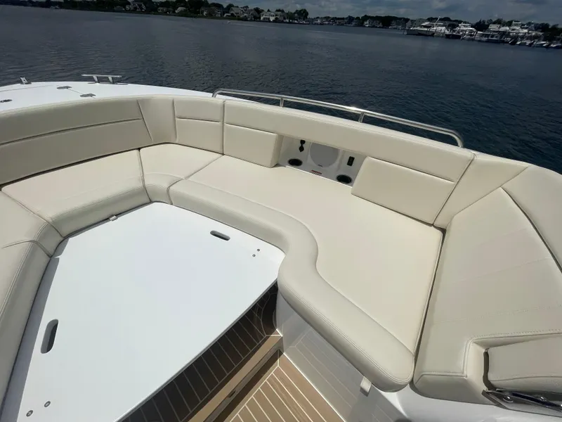 Slide: The Image of Luxurious seating area on the 2025 MJM 3 boat with scenic water view. - 13