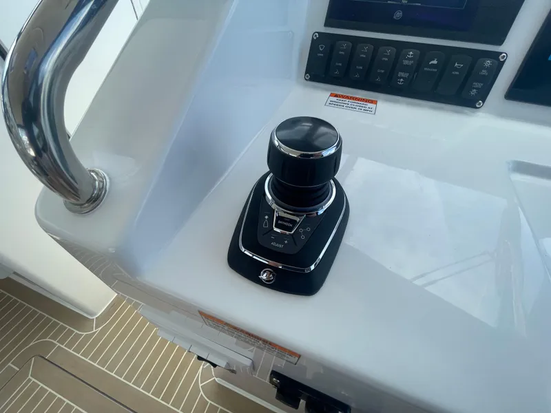 Slide: The Image of Joystick control on the 2025 MJM 3 boat dashboard. - 26