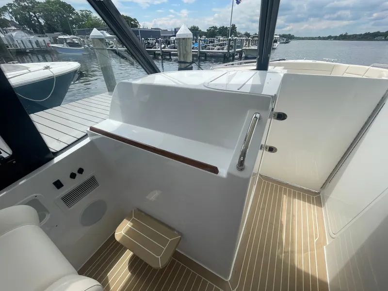 Slide: The Image of 2025 MJM 3 boat interior with modern design at a marina. - 32