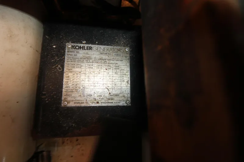 Slide: The Image of Kohler generator label on 1986 Senator 35 Sundeck Trawler, showing specifications and details. - 39