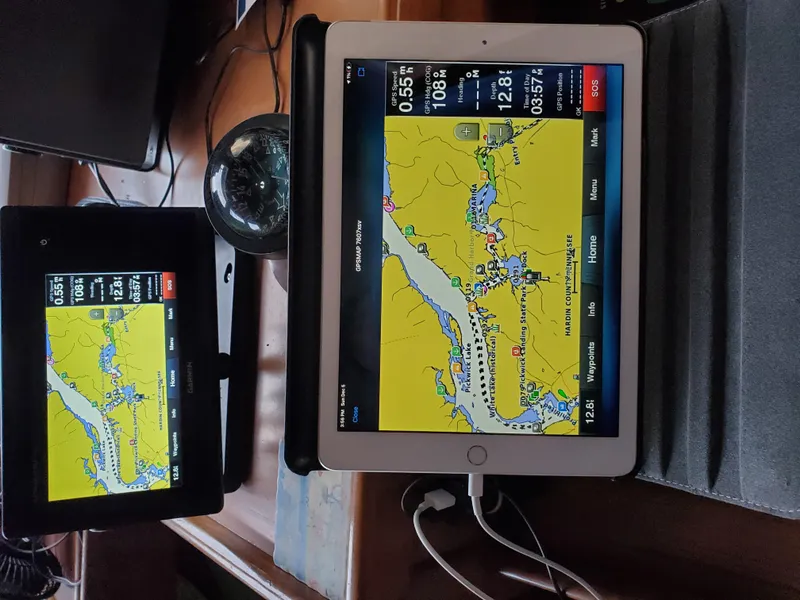 Slide: The Image of Navigation screens on 1986 Senator 35 Sundeck Trawler displaying nautical maps. - 46