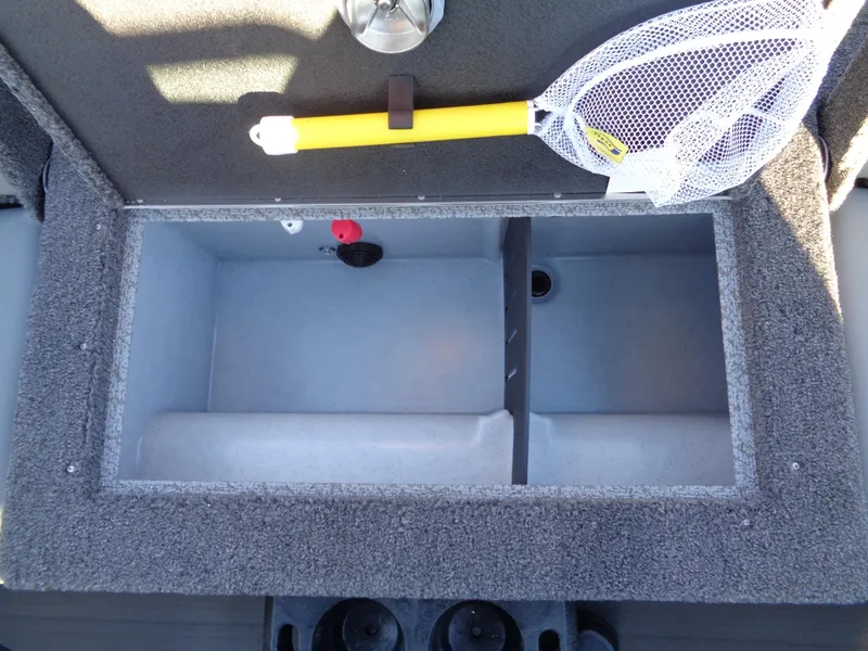 Slide: The Image of 2025 Lund 1875 Tyee boat compartment with fishing net and storage space. - 15