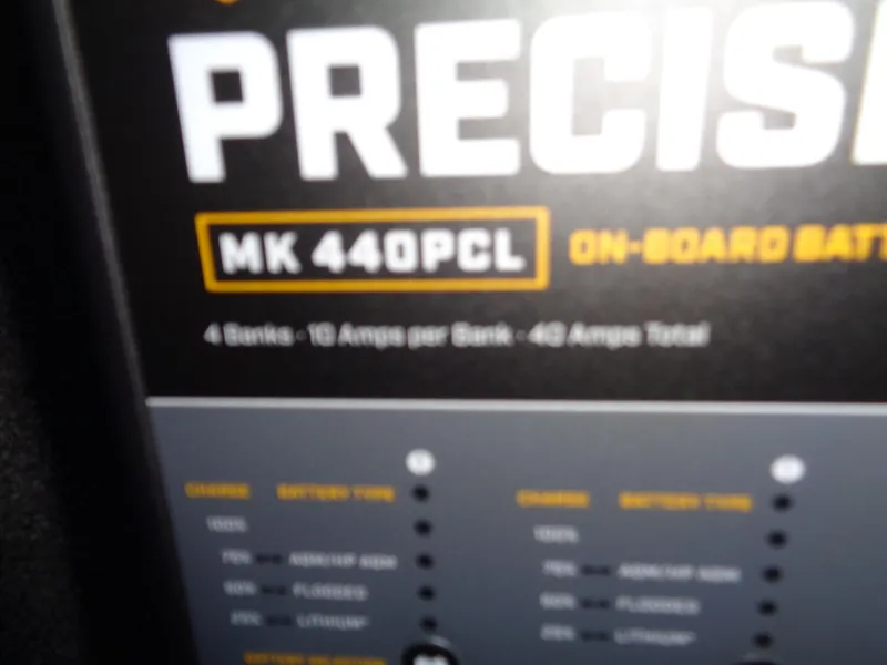 Slide: The Image of MK 440PCL on-board battery charger, 4 banks, 10 amps per bank, 40 amps total. - 32