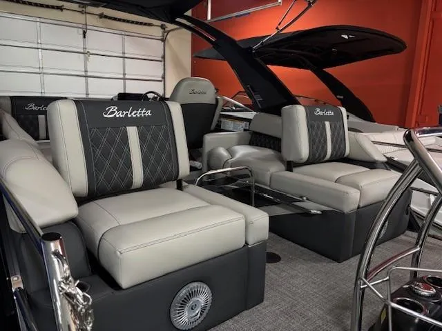Slide: The Image of Luxurious 2026 Barletta L25MA boat interior with plush seating and elegant design. - 6