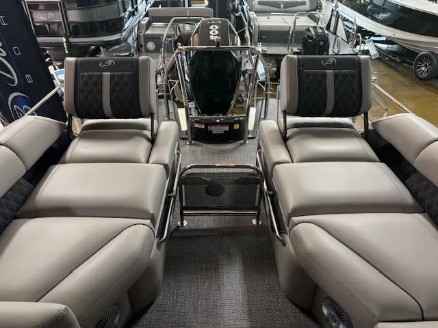 Slide: The Image of 2026 Barletta L25MA luxury pontoon boat interior with plush seating and modern design. - 7