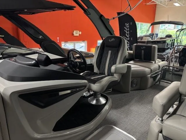 Slide: The Image of 2026 Barletta L25MA pontoon boat interior with modern seating and sleek design. - 8