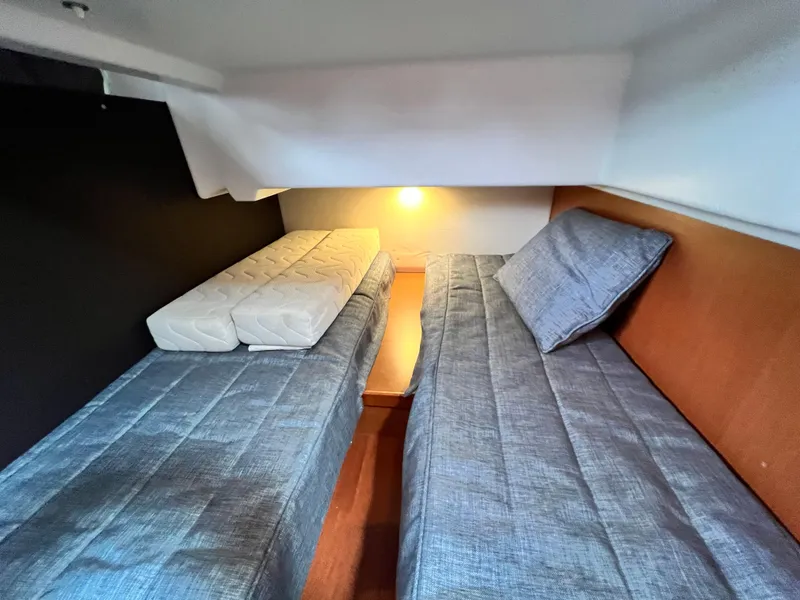 Slide: The Image of 2017 Jeanneau NC11 bathroom with sink, toilet, and shower area. - 46