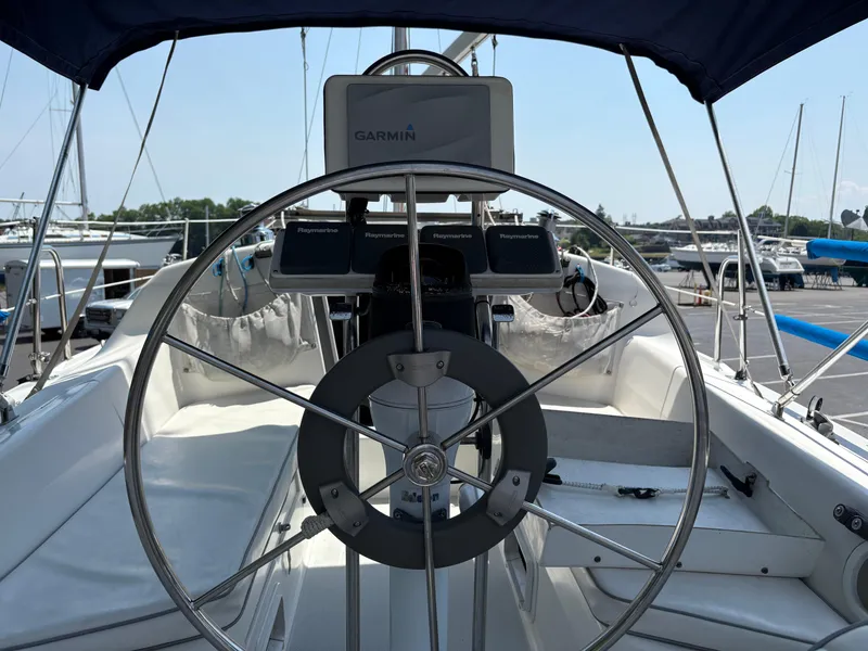 Slide: The Image of Cockpit of a 1994 Catalina 270 LE sailboat with Garmin navigation system. - 18