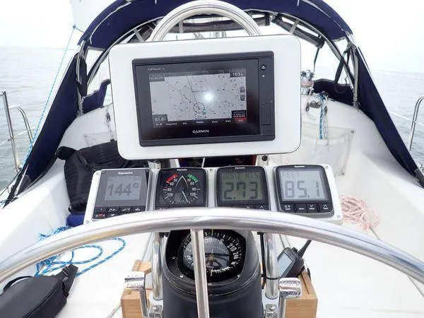 Slide: The Image of Cockpit of 1994 Catalina 270 LE sailboat with navigation instruments and compass. - 6