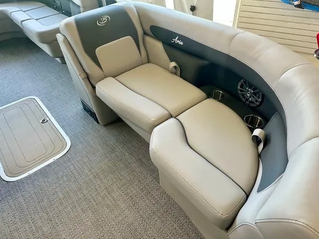 Slide: The Image of 2026 Barletta A20L boat interior with luxurious gray seating and cup holders. - 4