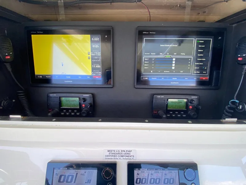 Slide: The Image of Dashboard of a 2017 Contender 35 Tournament boat with Garmin navigation displays. - 13