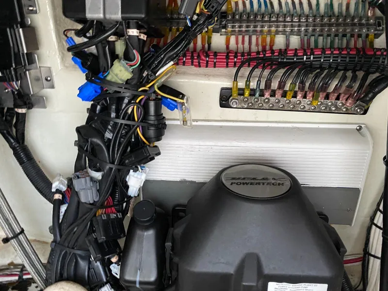 Slide: The Image of Electrical wiring and components inside a 2017 Contender 35 Tournament boat. - 16