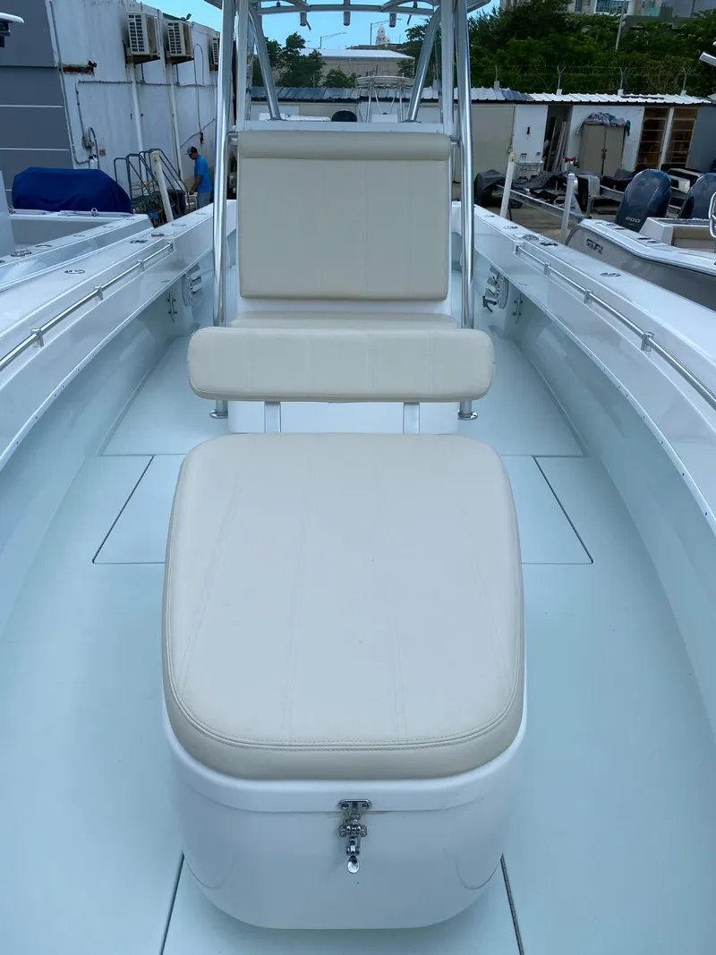 Slide: The Image of 2017 Contender 35 Tournament boat interior with cushioned seating and storage. - 18