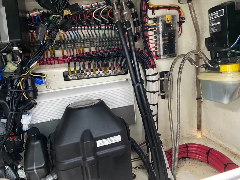 Slide: The Image of Electrical wiring and components inside a 2017 Contender 35 Tournament boat. - 21